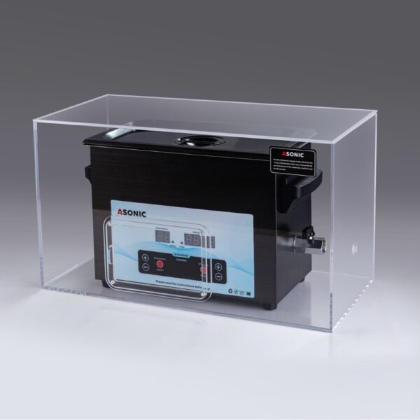 Limpiador ultrasónico ASONIC de 5 litros colocado dentro de una caja silenciosa que minimiza el ruido durante el funcionamiento.